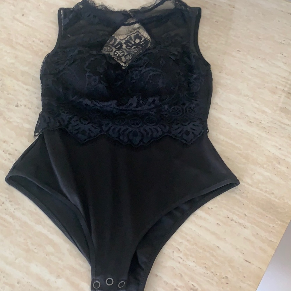 Never worn lace body suit